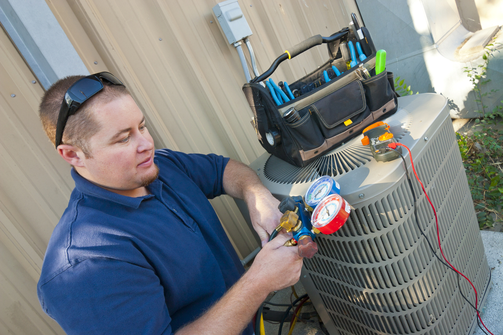 Technician Providing Emergency AC Repair
