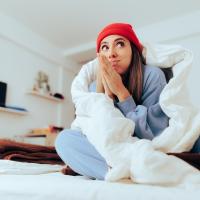 woman cold in her room