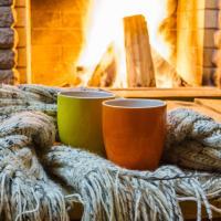 cozy home, warm mugs by the fire