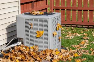 hvac system with leaves on it