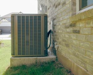 hvac outdoor unit attached to a house