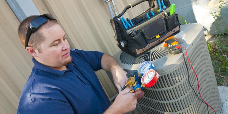 Technician Providing Emergency AC Repair