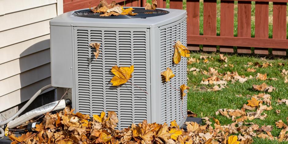 hvac system with leaves on it