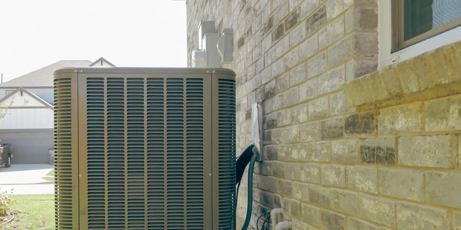 hvac outdoor unit attached to a house
