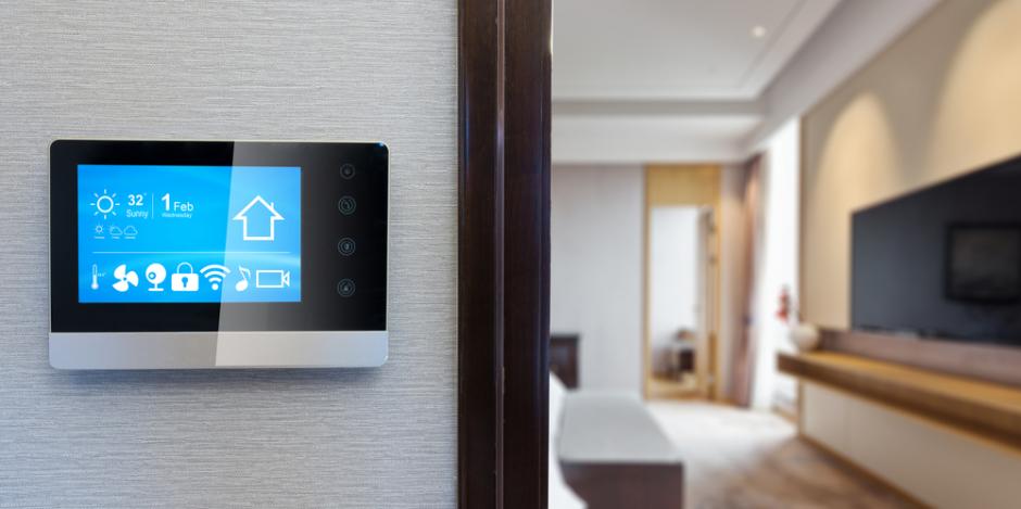 smart thermostat mounted on a wall