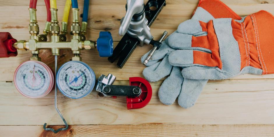 Tools for heating repair laid out on a table